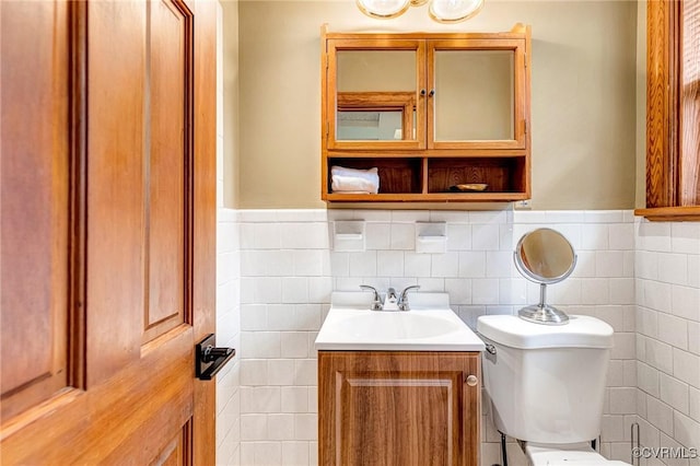 9065 Greenlake Cir, Mechanicsville, VA 23116 - half bath with vanity, tile walls, and a wainscoted wall