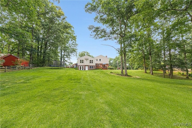 9065 Greenlake Cir, Mechanicsville, VA 23116 - view of yard with a trampoline