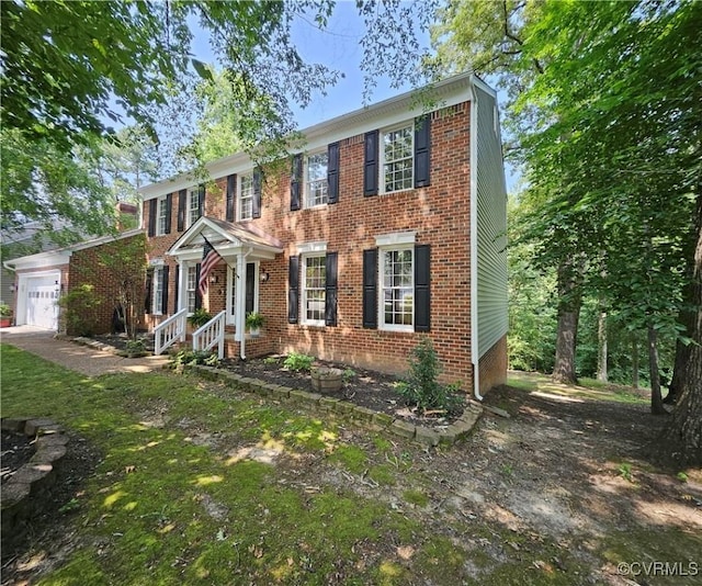 10278 Henderson Hall Rd, Mechanicsville, VA 20116 - colonial inspired home featuring brick siding and a garage