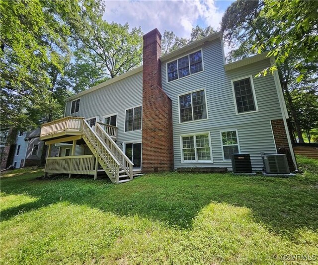 10278 Henderson Hall Rd, Mechanicsville, VA 20116 - back of property featuring a yard, a wooden deck, a chimney, and stairs