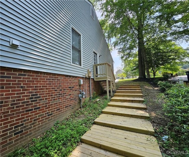 10278 Henderson Hall Rd, Mechanicsville, VA 23116 - view of side of home with stairs and brick siding
