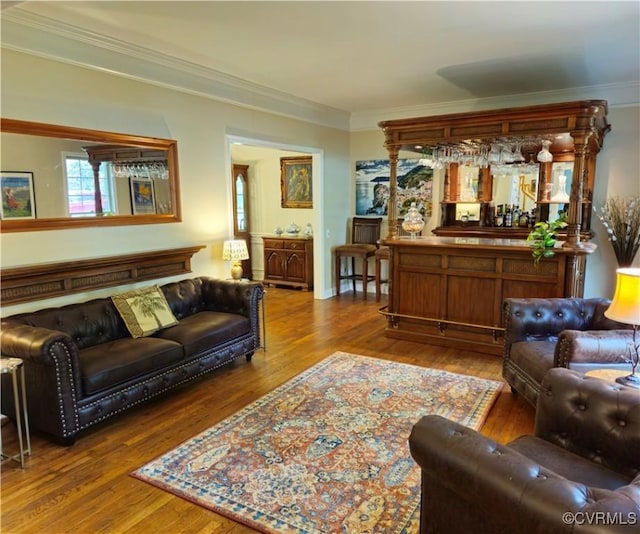 10278 Henderson Hall Rd, Mechanicsville, VA 20116 - living area with ornamental molding, wood finished floors, and a bar