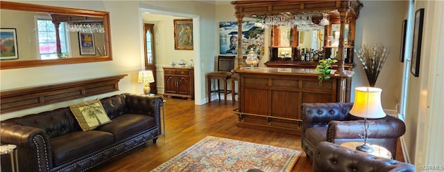 10278 Henderson Hall Rd, Mechanicsville, VA 20116 - living area featuring wood finished floors, a dry bar, and crown molding