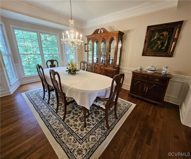 10278 Henderson Hall Rd, Mechanicsville, VA 20116 - dining area featuring a chandelier, dark wood-style floors, a decorative wall, crown molding, and wainscoting