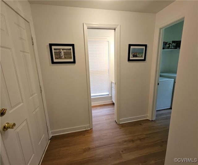 10278 Henderson Hall Rd, Mechanicsville, VA 20116 - hallway with dark wood finished floors and washing machine and clothes dryer