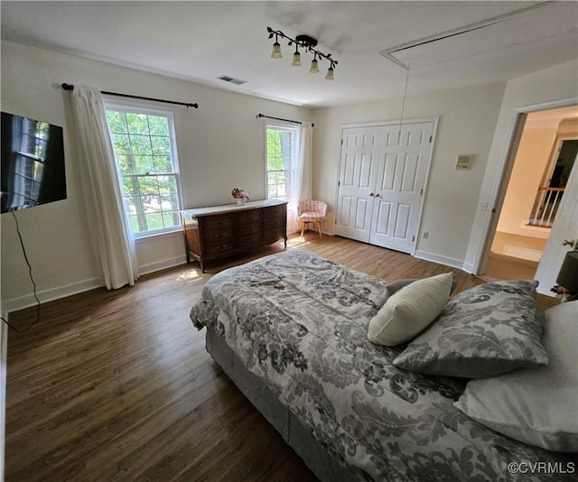 10278 Henderson Hall Rd, Mechanicsville, VA 20116 - bedroom featuring attic access, wood finished floors, and rail lighting