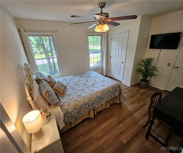 10278 Henderson Hall Rd, Mechanicsville, VA 20116 - bedroom featuring dark wood-style flooring and ceiling fan