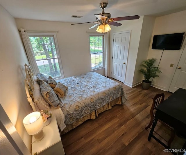 10278 Henderson Hall Rd, Mechanicsville, VA 23116 - bedroom with dark wood-type flooring and ceiling fan