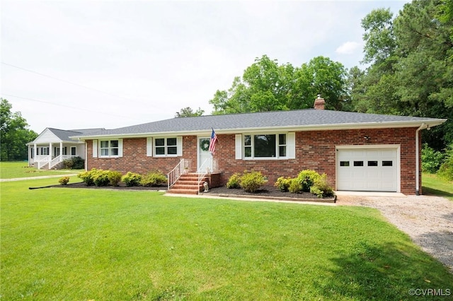 2000 Point Of Rocks Rd, Chester, VA 23836 - single story home featuring an attached garage, brick siding, gravel driveway, a front yard, and a chimney