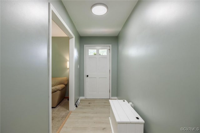 2000 Point Of Rocks Rd, Chester, VA 23836 - doorway to outside with light wood-style flooring and baseboards