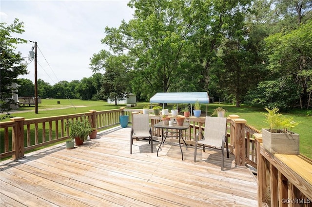2000 Point Of Rocks Rd, Chester, VA 23836 - wooden terrace with a lawn, outdoor dining area, and view of wooded area