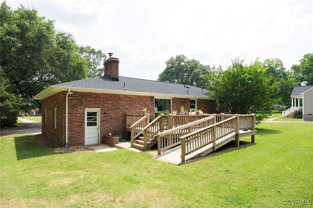 2000 Point Of Rocks Rd, Chester, VA 23836 - rear view of property featuring brick siding, a yard, a deck, a chimney, and roof with shingles