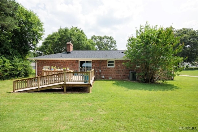 2000 Point Of Rocks Rd, Chester, VA 23836 - rear view of house with brick siding, a wooden deck, a chimney, and a yard