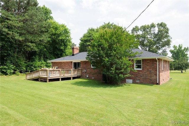 2000 Point Of Rocks Rd, Chester, VA 23836 - rear view of house featuring brick siding, crawl space, a wooden deck, and a lawn