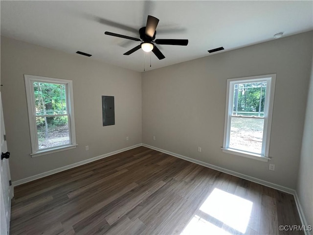 8104 Strath Rd, Henrico, VA 23231 - spare room featuring electric panel, plenty of natural light, wood finished floors, and a ceiling fan