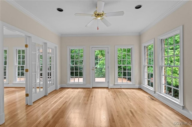 9261 Royal Grant Dr, Hanover, VA 23116 - unfurnished sunroom with french doors, wood finished floors, plenty of natural light, ornamental molding, and a deck