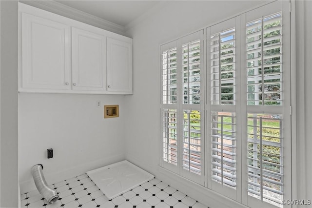 9261 Royal Grant Dr, Hanover, VA 23116 - laundry room featuring cabinet space, hookup for an electric dryer, tile patterned floors, washer hookup, and crown molding