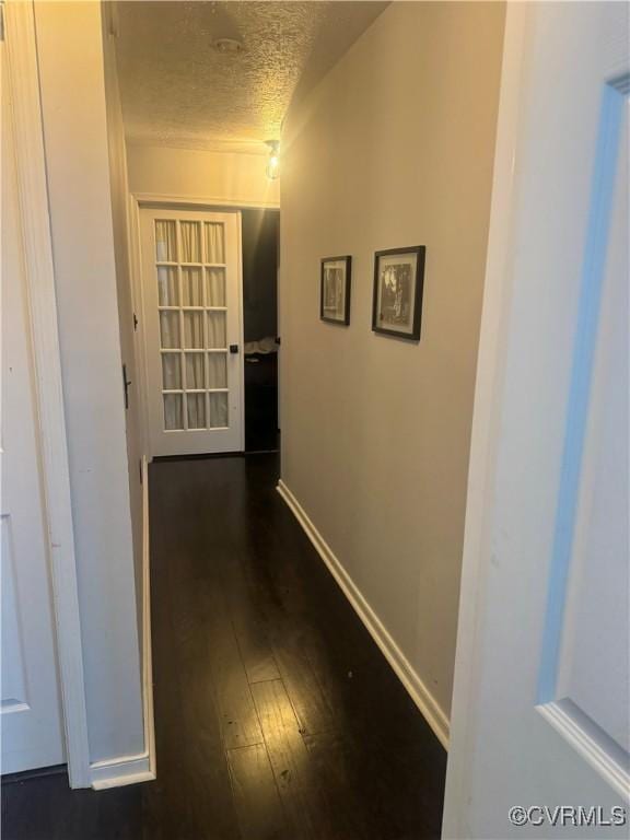 31368 Old Dawn Rd, Hanover, VA 23069 - corridor with dark wood finished floors and a textured ceiling