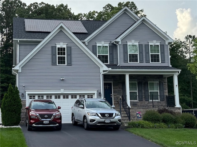 15518 Centerline Ct, Chesterfield, VA 23832 - view of front of home featuring driveway, covered porch, a garage, and stone siding