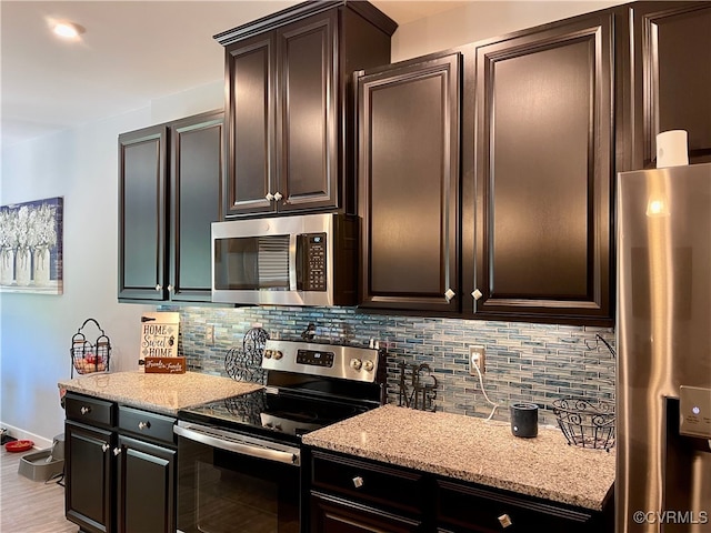 15518 Centerline Ct, Chesterfield, VA 23832 - kitchen with stainless steel appliances, decorative backsplash, light stone countertops, and light wood-type flooring
