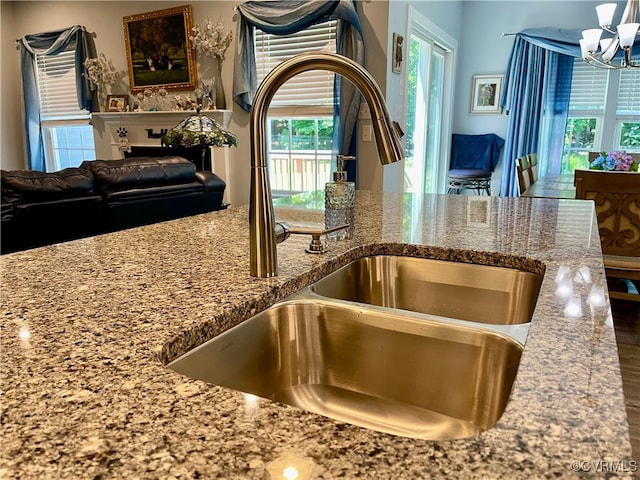 15518 Centerline Ct, Chesterfield, VA 23832 - kitchen view of a chandelier and stone countertops