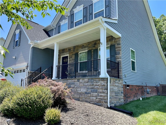 15518 Centerline Ct, Chesterfield, VA 23832 - view of front of property with a porch, stone siding, and an attached garage