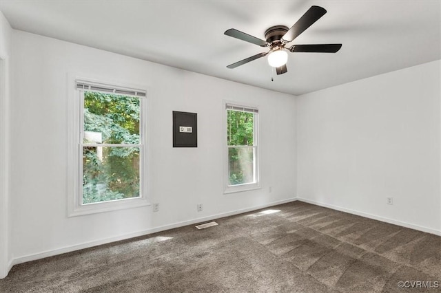 15241 Broadwater Cir, Chesterfield, VA 23831 - unfurnished room featuring electric panel, dark carpet, and a ceiling fan