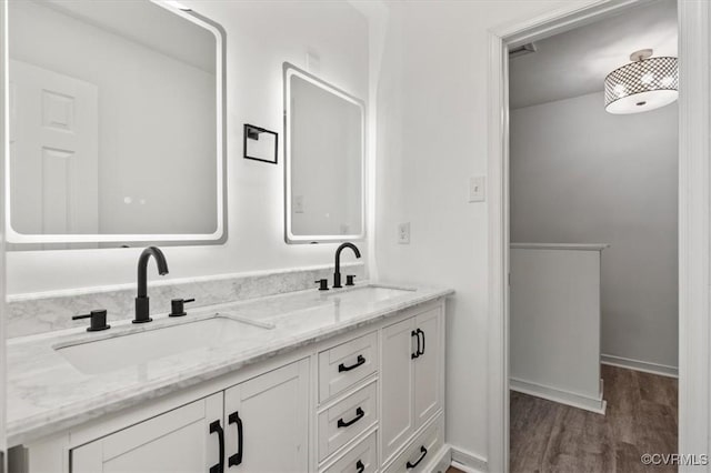 15241 Broadwater Cir, Chesterfield, VA 23831 - full bathroom featuring double vanity and wood finished floors