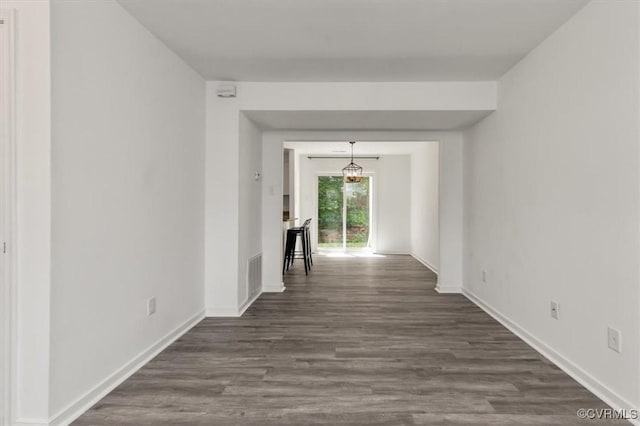 15241 Broadwater Cir, Chesterfield, VA 23831 - hallway featuring dark wood-type flooring and baseboards