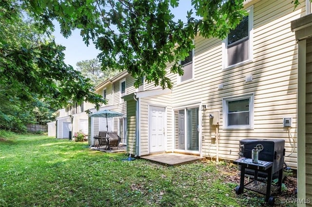 15241 Broadwater Cir, Chesterfield, VA 23831 - rear view of property featuring a yard and a patio area