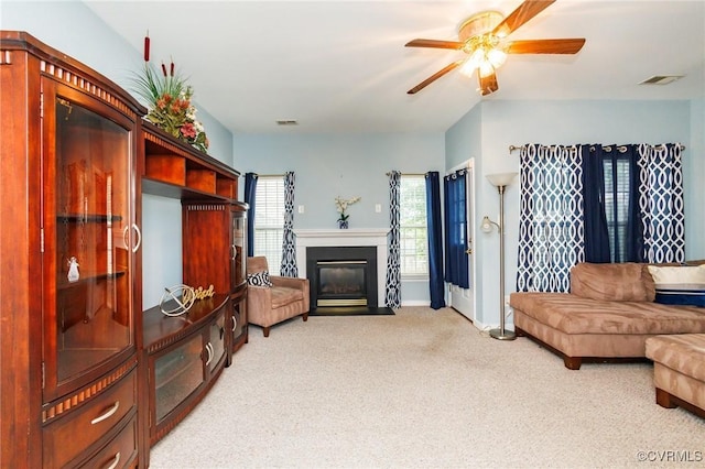 405 Hollybrook Ridge Ln, Richmond, VA 23223 - living area featuring light colored carpet, ceiling fan, and a fireplace with flush hearth