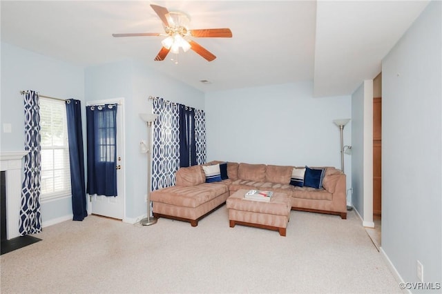 405 Hollybrook Ridge Ln, Richmond, VA 23223 - living area with light carpet, ceiling fan, and a fireplace with flush hearth
