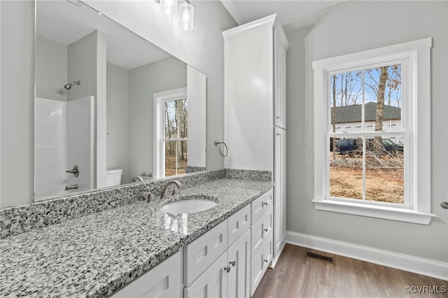 4858 Powhatan Lakes Rd, Powhatan, VA 23139 - full bath with vanity, wood finished floors, and washtub / shower combination