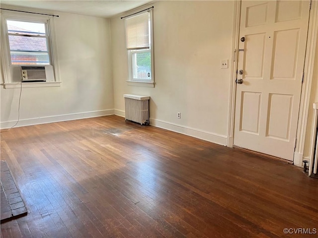 3305 Jeter Ave, Richmond, VA 23222 - unfurnished room featuring radiator, hardwood / wood-style floors, and healthy amount of natural light