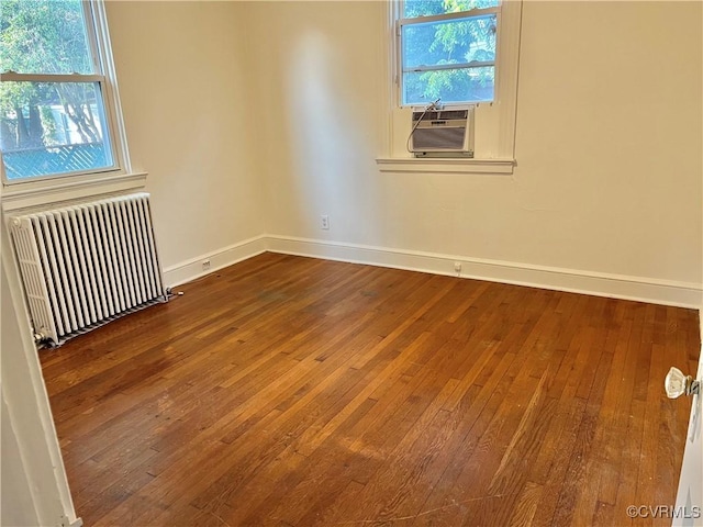 3305 Jeter Ave, Richmond, VA 23222 - empty room with radiator, wood-type flooring, and cooling unit