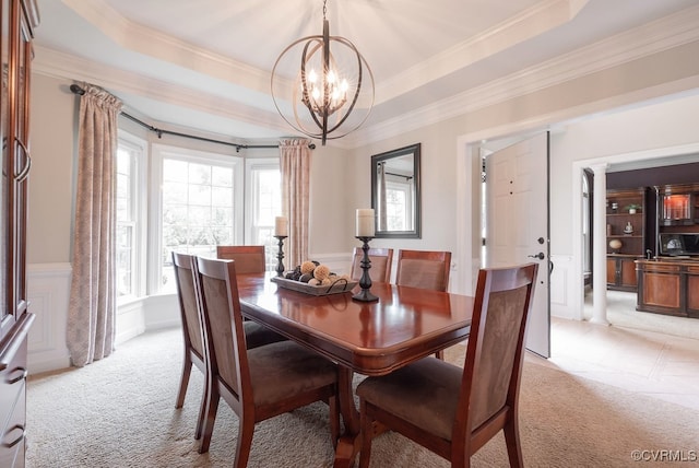 6013 Glen Abbey Dr, Glen Allen, VA 23059 - dining space with light carpet, a chandelier, healthy amount of natural light, a tray ceiling, and crown molding
