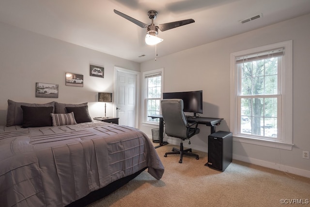 6013 Glen Abbey Dr, Glen Allen, VA 23059 - bedroom featuring multiple windows, light carpet, a desk, and ceiling fan