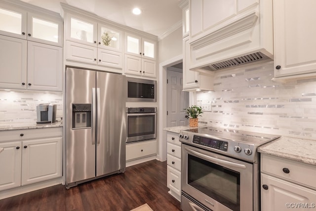 6013 Glen Abbey Dr, Glen Allen, VA 23059 - kitchen featuring appliances with stainless steel finishes, custom range hood, decorative backsplash, white cabinetry, and crown molding