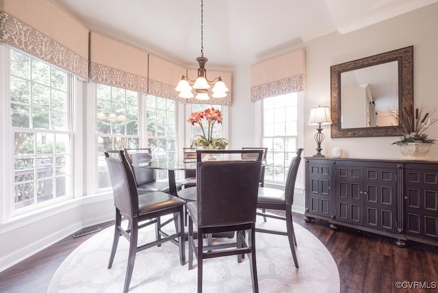 6013 Glen Abbey Dr, Glen Allen, VA 23059 - dining space featuring a chandelier, dark wood finished floors, and crown molding