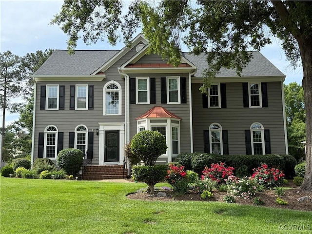 6013 Glen Abbey Dr, Glen Allen, VA 23059 - colonial house with a front yard and roof with shingles