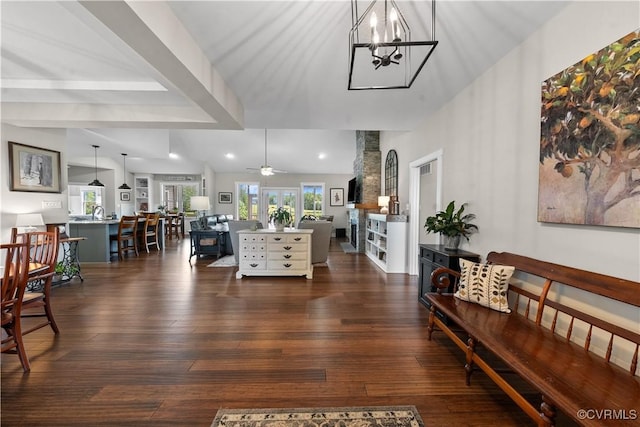 11561 Smokehouse Dr, Amelia Courthouse, VA 23002 - living area with dark wood-type flooring, healthy amount of natural light, recessed lighting, a ceiling fan, and a chandelier
