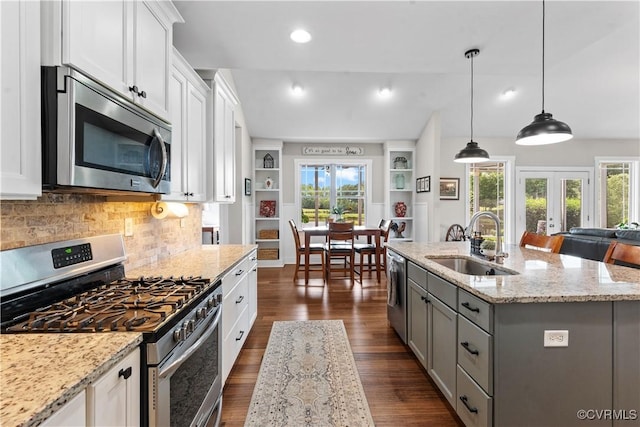 11561 Smokehouse Dr, Amelia Courthouse, VA 23002 - kitchen with stainless steel appliances, healthy amount of natural light, white cabinets, and recessed lighting