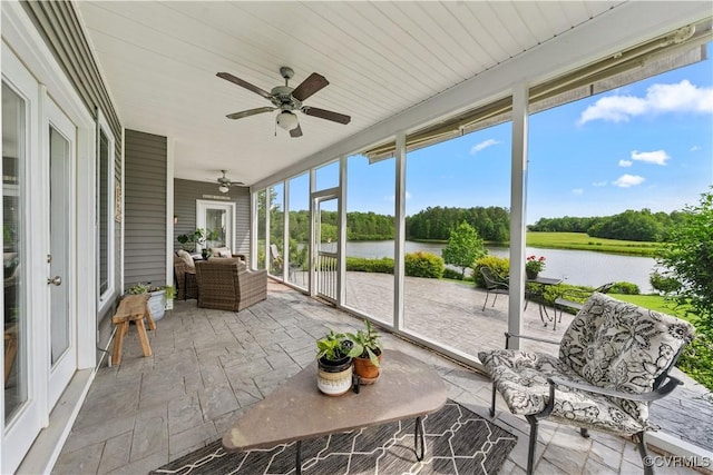 11561 Smokehouse Dr, Amelia Courthouse, VA 23002 - sunroom featuring a water view, a ceiling fan, an outdoor living space, and view of scattered trees