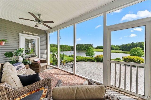 11561 Smokehouse Dr, Amelia Courthouse, VA 23002 - sunroom featuring a water view, ceiling fan, and view of wooded area