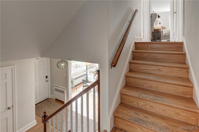 4824 Coleman Rd, Richmond, VA 23230 - stairs featuring radiator heating unit and wood finished floors