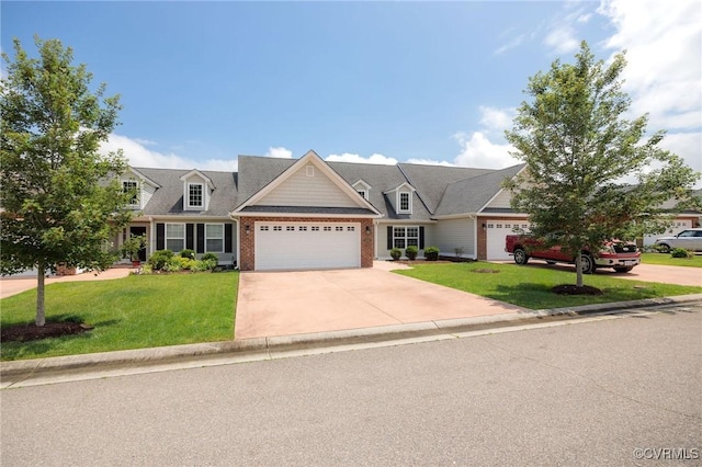3316 Kennington Park Rd, King William, VA 23009 - view of front of property featuring an attached garage, concrete driveway, a front lawn, and brick siding