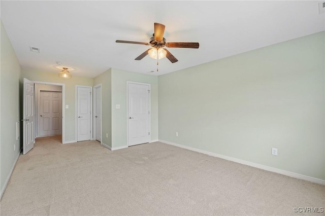 3316 Kennington Park Rd, King William, VA 23009 - unfurnished bedroom featuring light colored carpet and a ceiling fan