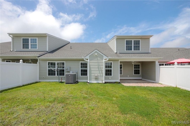 3316 Kennington Park Rd, King William, VA 23009 - back of property featuring a patio, a fenced backyard, and a shingled roof