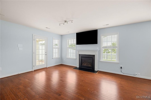 3316 Kennington Park Rd, King William, VA 23009 - unfurnished living room with a fireplace with flush hearth and hardwood / wood-style flooring