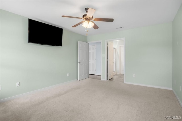 3316 Kennington Park Rd, King William, VA 23009 - unfurnished bedroom featuring light carpet, ceiling fan, and ensuite bath